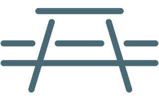 an icon of a picnic table in blue